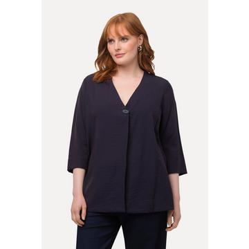 Blusa testurizzata dal taglio oversize, scollo a V e maniche a 3/4