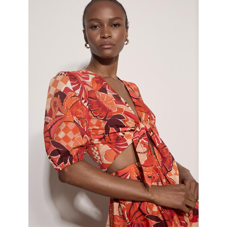 APRICOT Top con patchwork di foglie tropicali e nodo frontale  