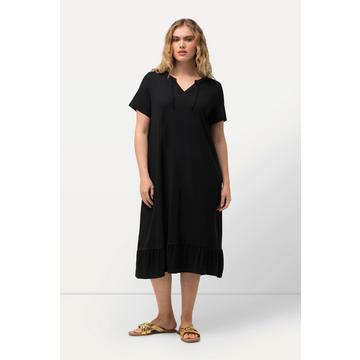 Robe midi en jersey, avec col tunisien et manches courtes. Silhouette en A évasée.