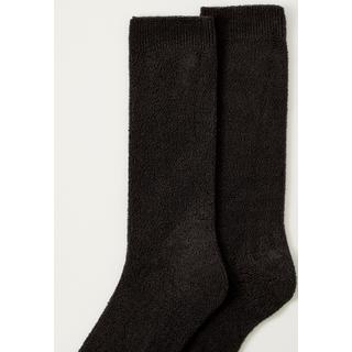 Damart  Chaussettes maille jersey. 