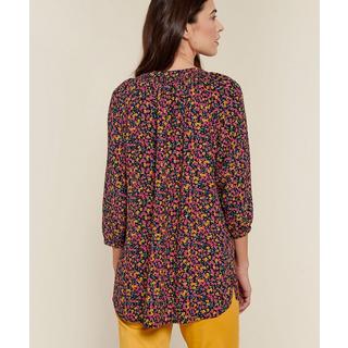 Damart  Blouse crêpe fleurie. 