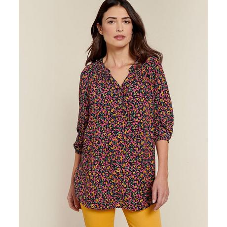 Damart  Blouse crêpe fleurie. 