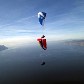 Geschenkidee  Vol biplace en parapente avec vue sur le Léman (pour 2 personnes) 