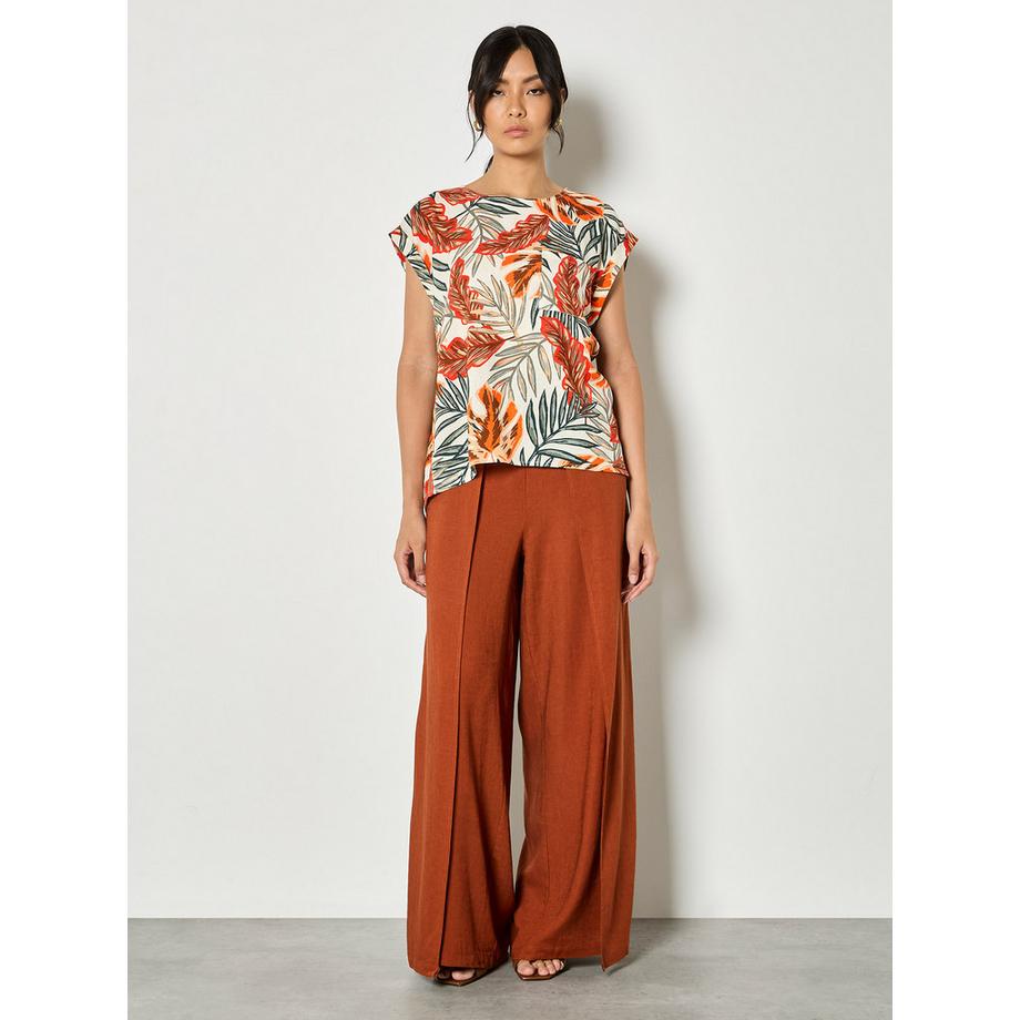T-shirt tissé à motifs de feuilles tropicales