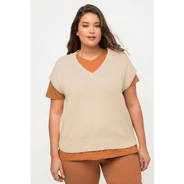 Pull sans manches en coton bio. Profond décolleté en V.