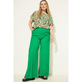 Studio Untold  Pantalon à jambe large et taille élastique. Ouverture de type fente latérale 