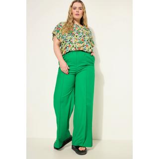 Studio Untold  Pantalon à jambe large et taille élastique. Ouverture de type fente latérale 