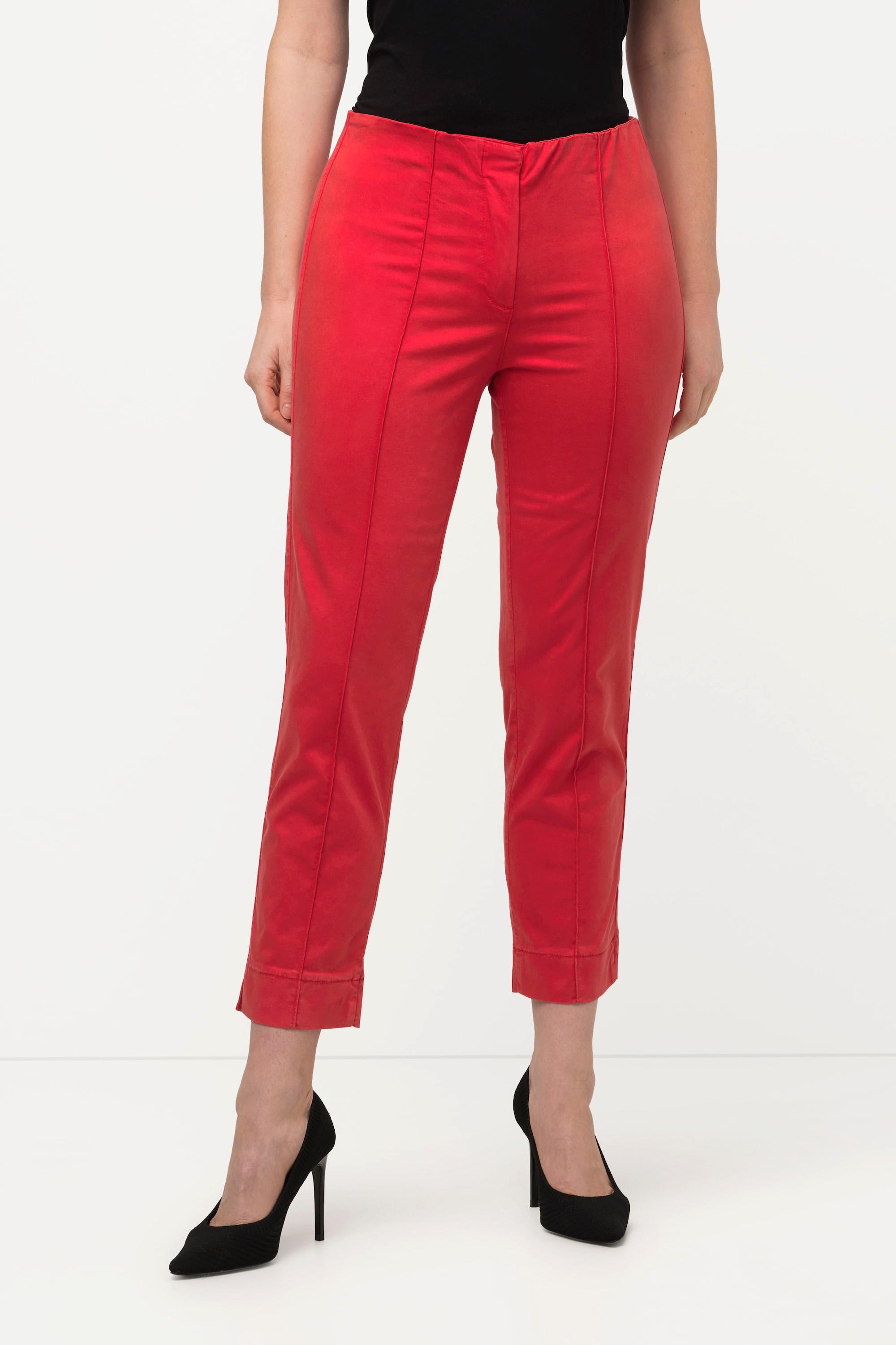 Ulla Popken  Pantalon avec passepoil et taille élastique. Coupe ajustée avec fente sur le bas de jambe. 