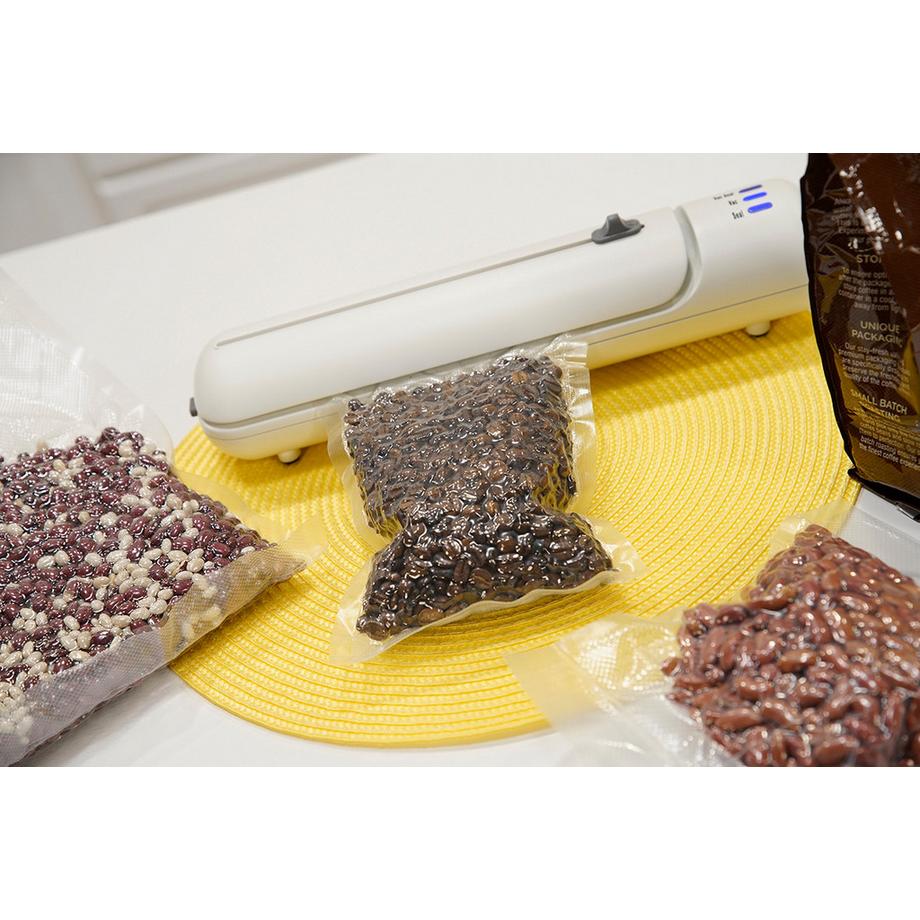 STARLYF Vacuum Sealer - Set risparmio per sottovuoto, macchina per sottovuoto per alimenti, 140 Watt, larghezza rotolo 20 cm, incl. 20 sacchetti, 2 rotoli per sottovuoto e ricette  