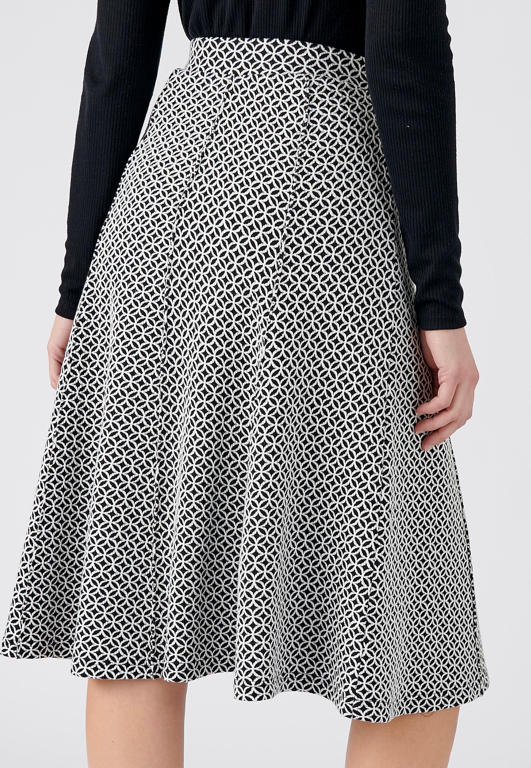 Damart  Jupe évasée maille jacquard stretch. 