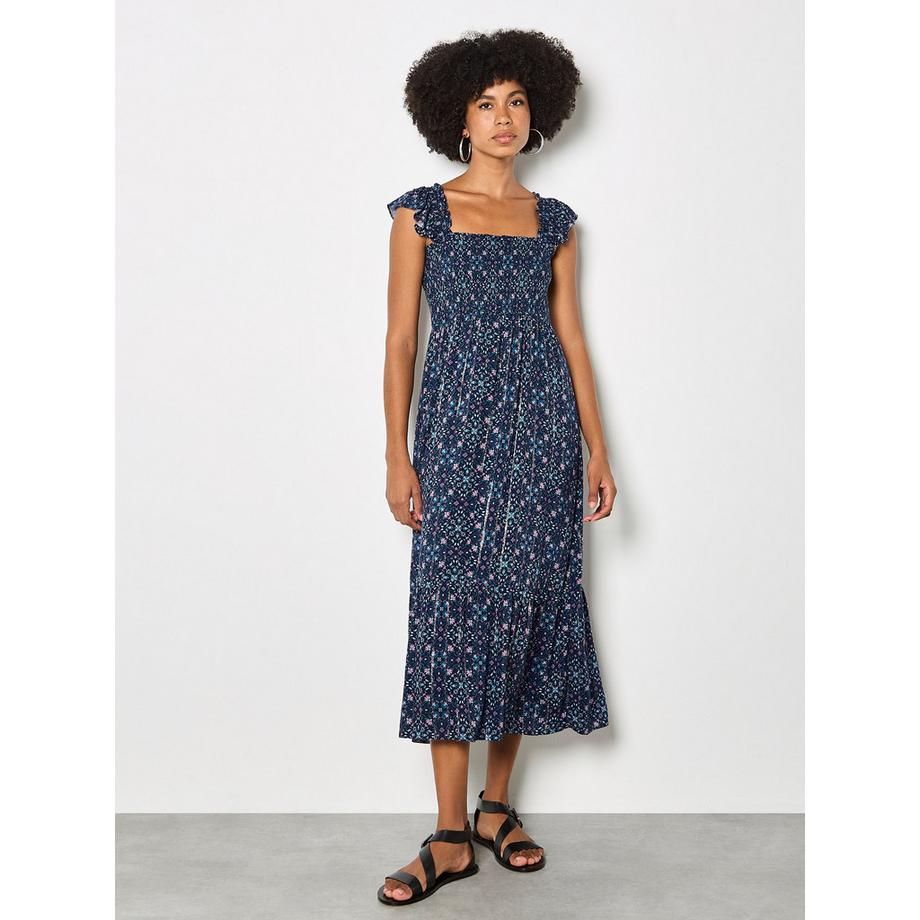 Robe mi-longue à fleurs folk métallisées