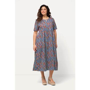 Robe maxi en jersey. Coupe trapèze, col rond et manches courtes. Poches