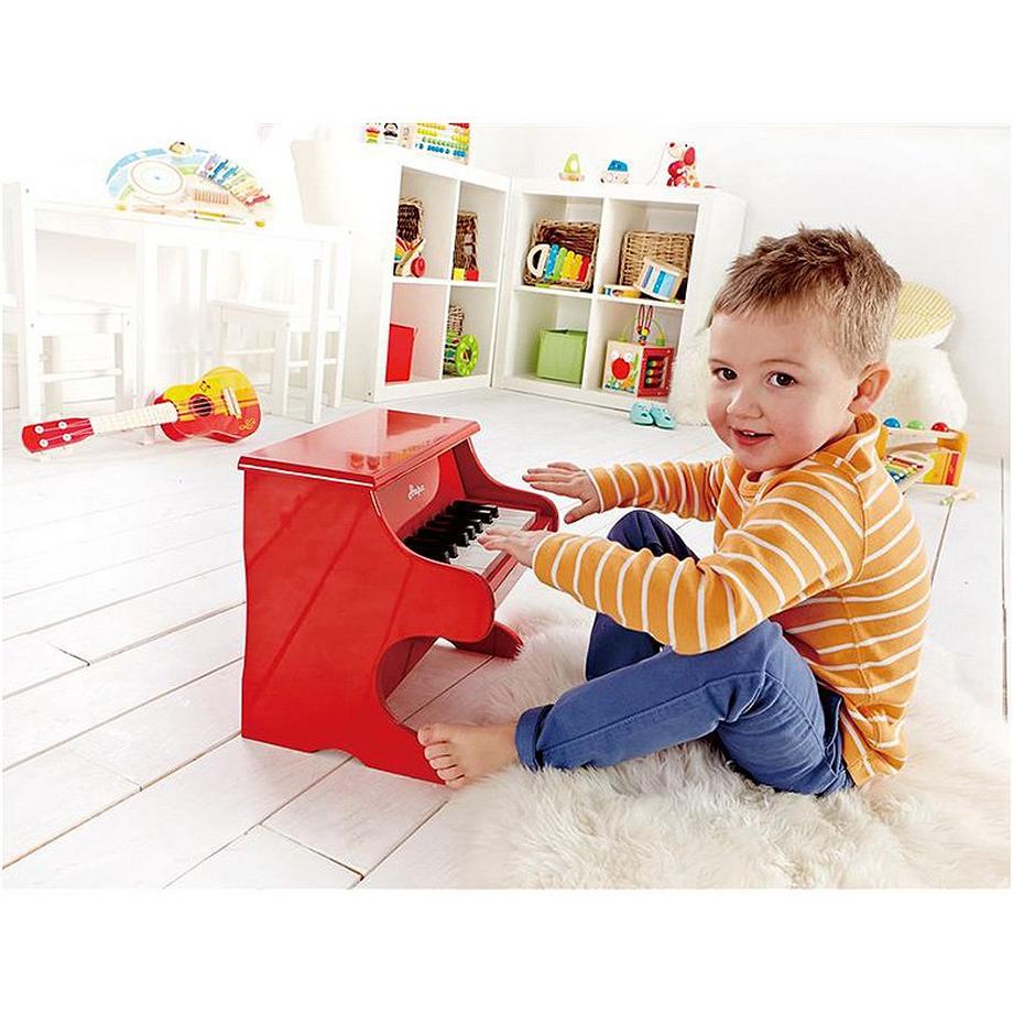 Hape  Spielzeug-Klavier | Tastatur mit 18 Tasten, Musikinstrument für Kinder aus Holz, Rot 