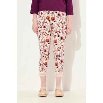 Legging 7/8 en coton bio, taille élastique. Imprimé à fleurs et dentelle.