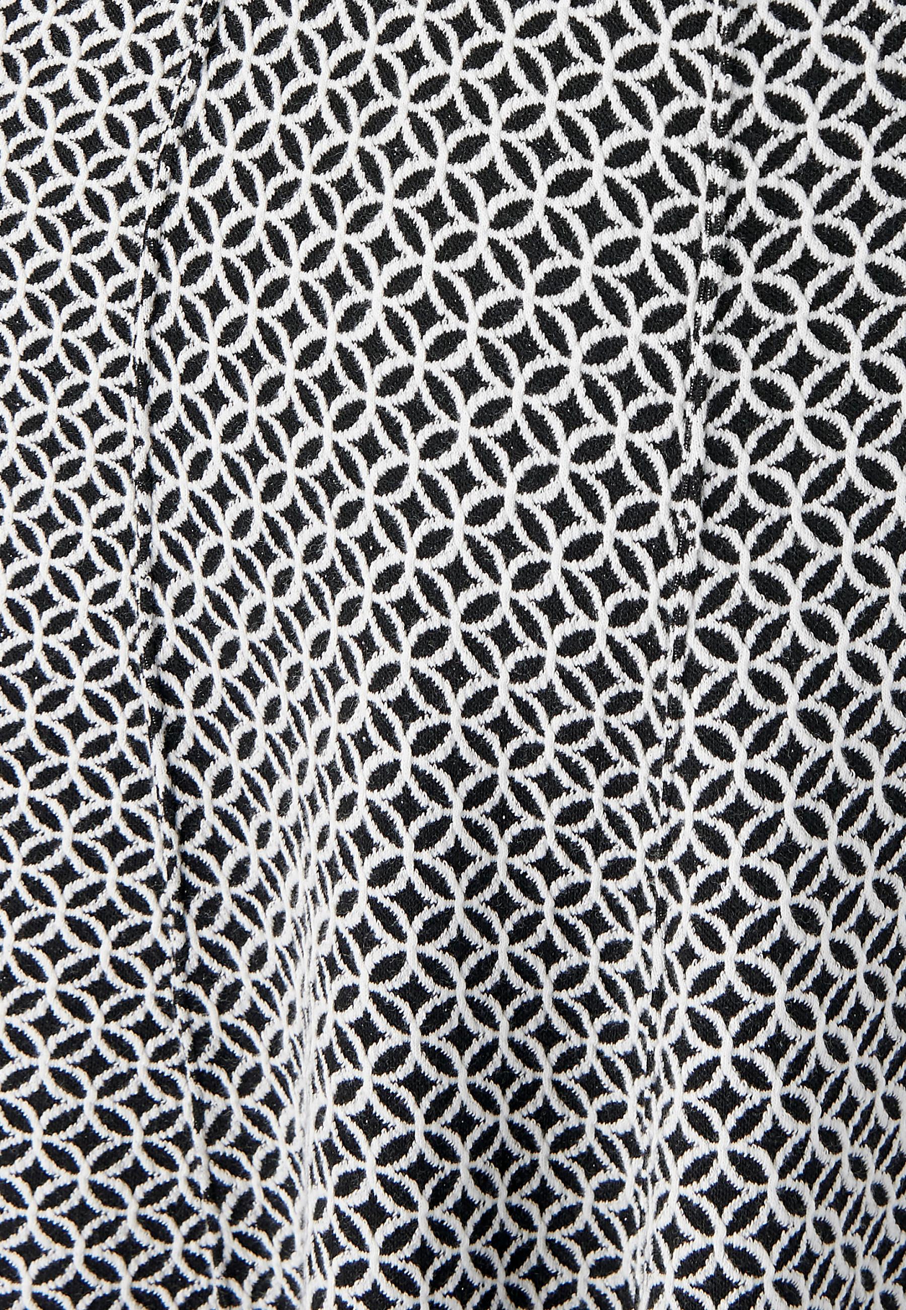 Damart  Jupe évasée maille jacquard stretch. 