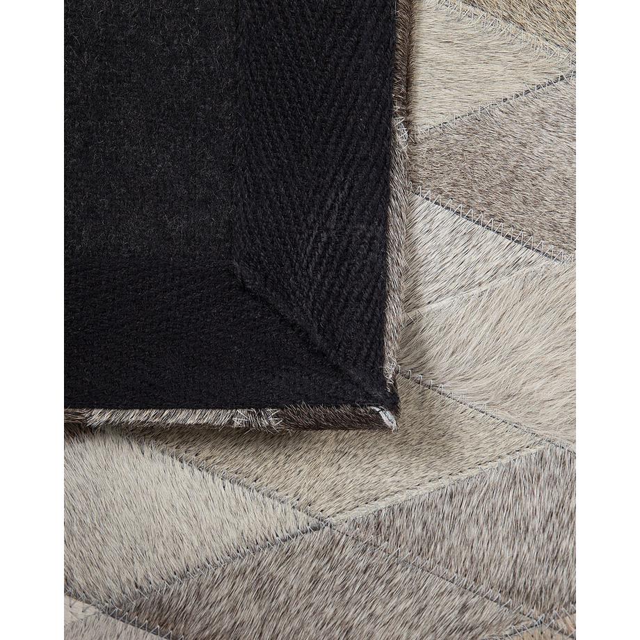 Beliani Teppich aus Kuhfell  MALDAN  