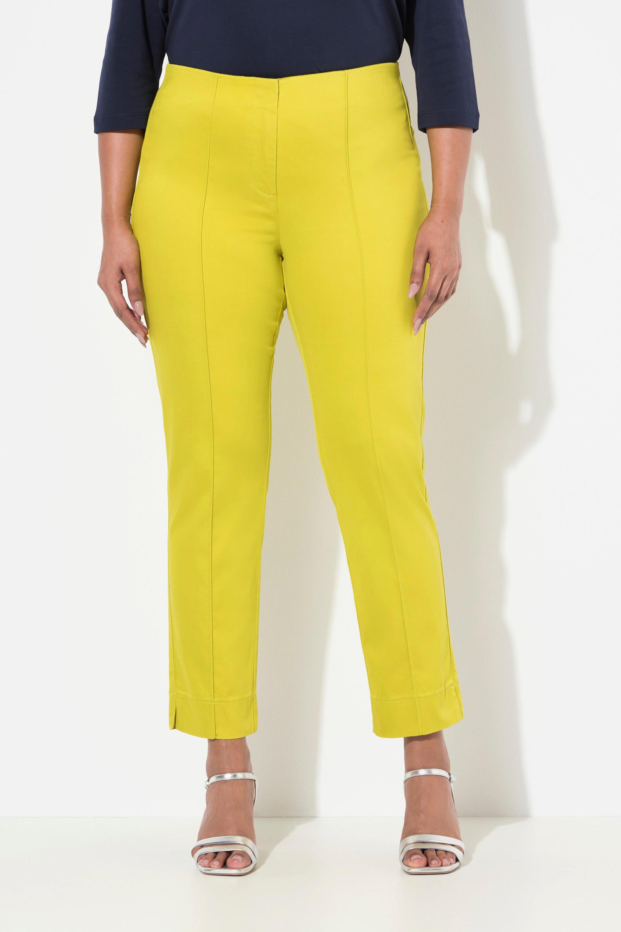 Ulla Popken  Pantalon avec passepoil et taille élastique. Coupe ajustée avec fente sur le bas de jambe. 