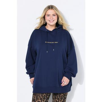 Sweat à capuche oversize. Message scintillant