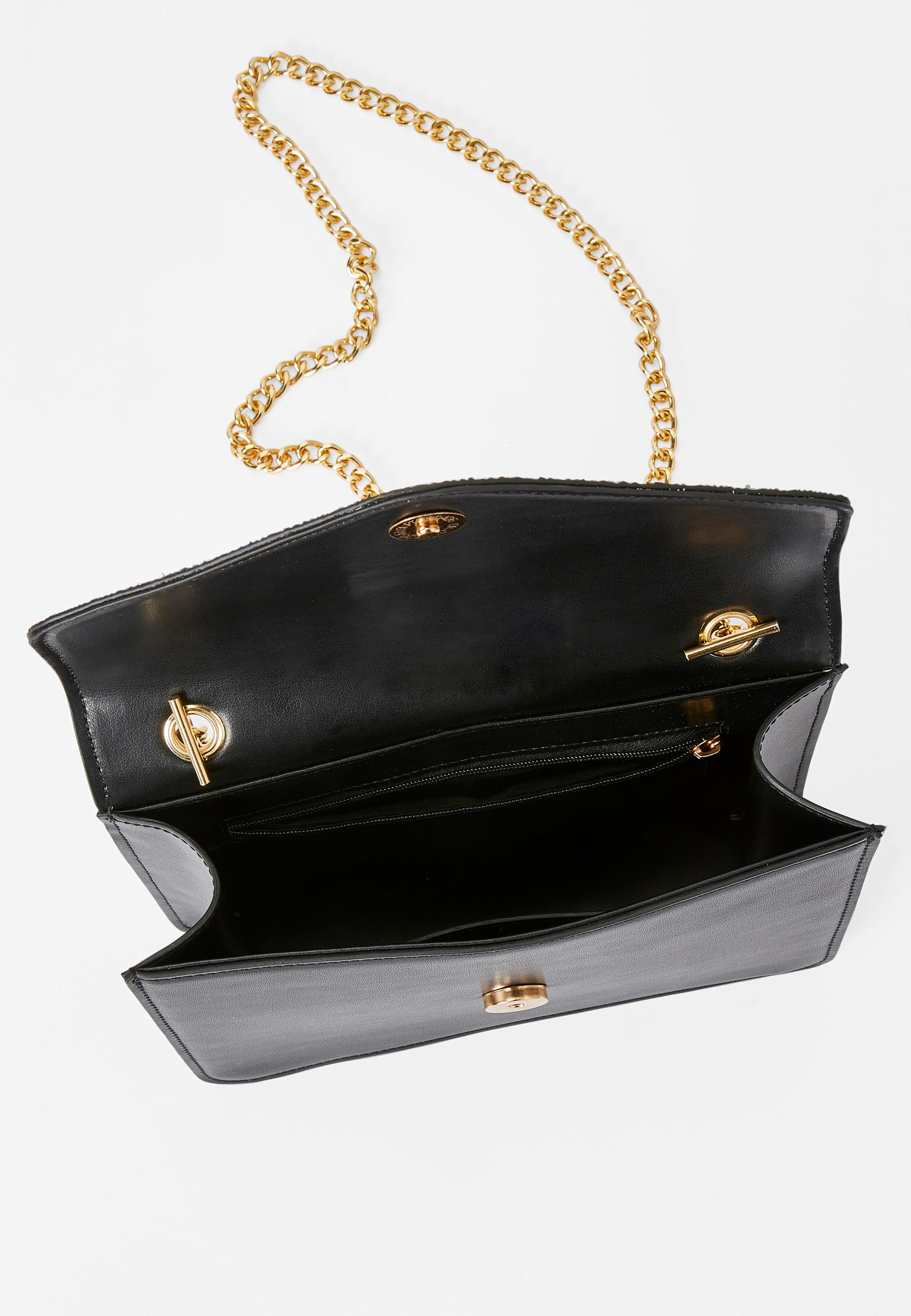 Damart  Clutch mit Paillettenklappe. 