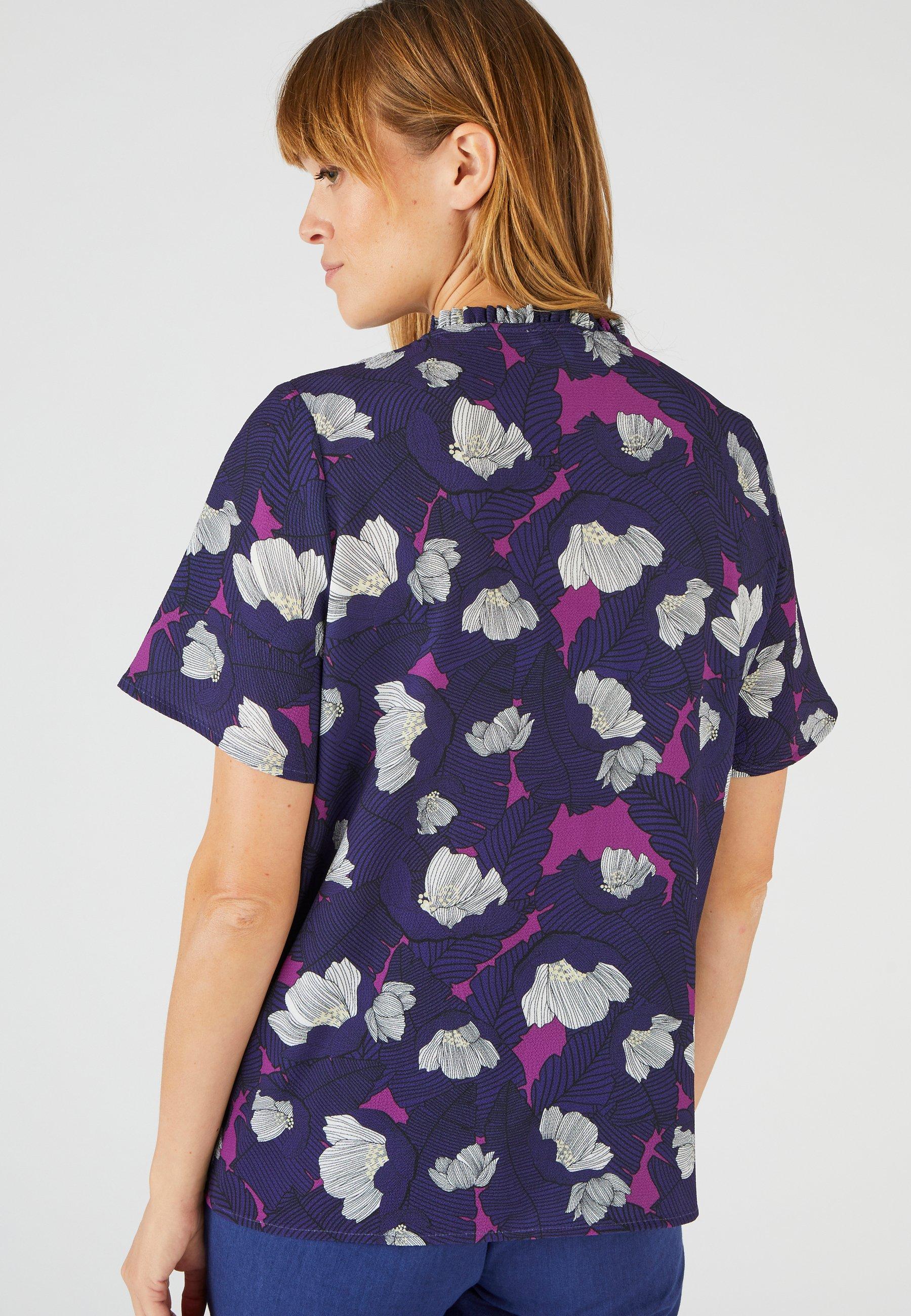 Damart  Bluse aus strukturiertem Crêpe-Stretch. 