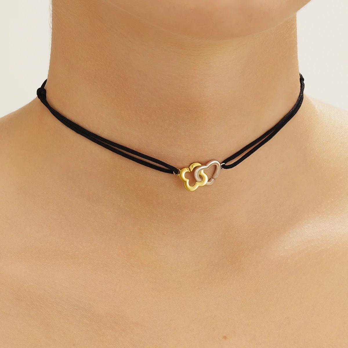 Charles Garnier  Girocollo PASSION con cuore e trifoglio intrecciati in argento bicolore 