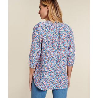 Damart  Blouse crêpe fleurie. 