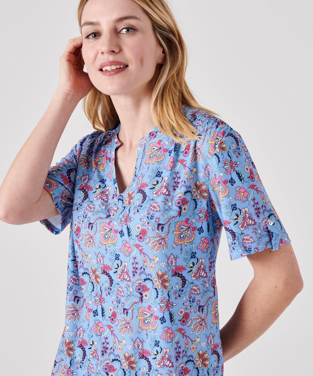 Damart  Blouse crêpe stretch fluide. 