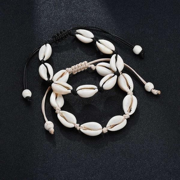 eStore  Bracciale Regolabile con conchiglie bianche - Nero 