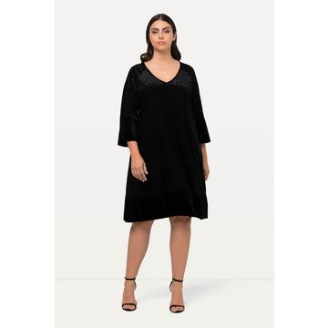 Robe midi à col rond et manches 3/4. Motif léopard et silhouette en A.