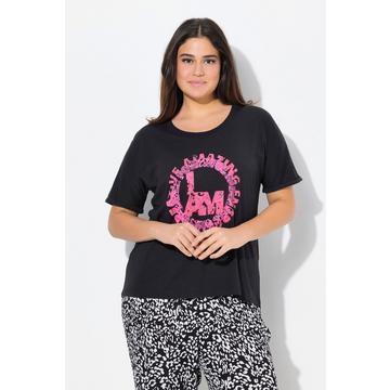 T-shirt oversize. Col rond et manches courtes. Motif rond