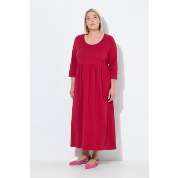 Maxi abito in jersey dal taglio svasato con scollo a girocollo, maniche a 3/4 e tasche