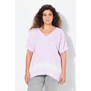 Blouse en mousseline oversize. Décolleté V et manches courtes
