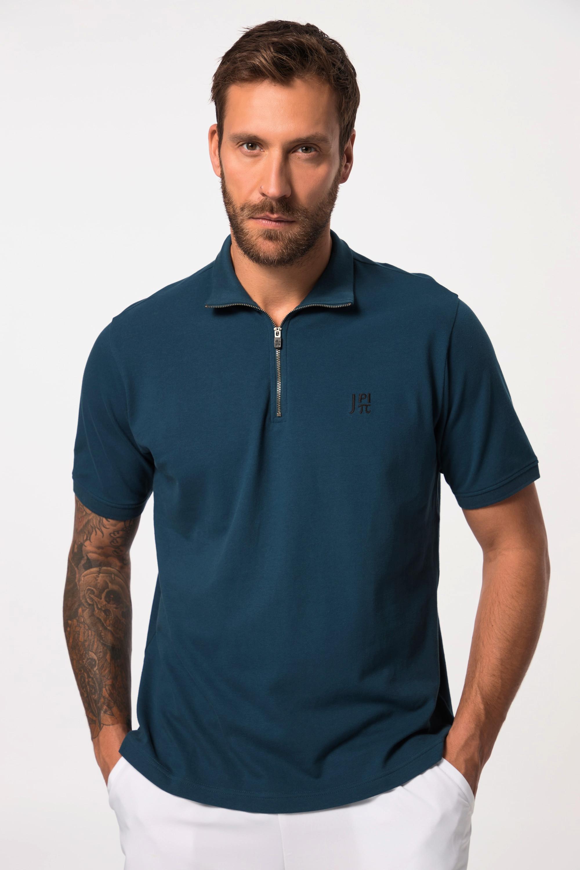 JP1880  Polo en maille piquée, spécial tennis. Fermeture zippée et manches courtes. Technologie FLEXNAMIC®. 