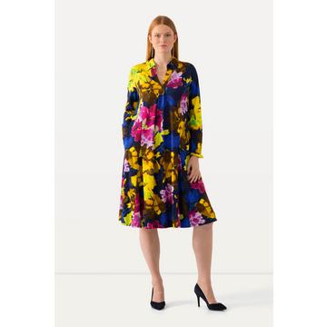 Robe midi à motif floral. Col chemise avec encolure en V. Manches longues et plis godets.