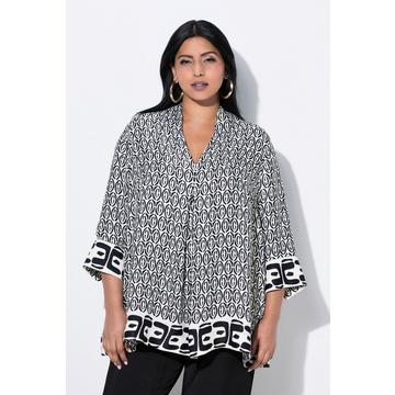 Tunica dal taglio svasato con scollo montante a V e maniche a 3/4