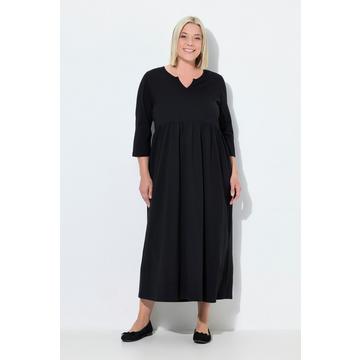 Robe en jersey, coupe évasée. Col tunisien et manches 3/4