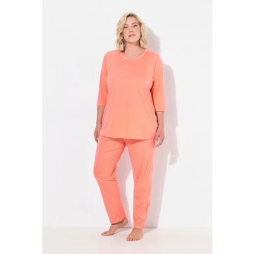 Pigiama con pois, scollo a girocollo e maniche a 3/4