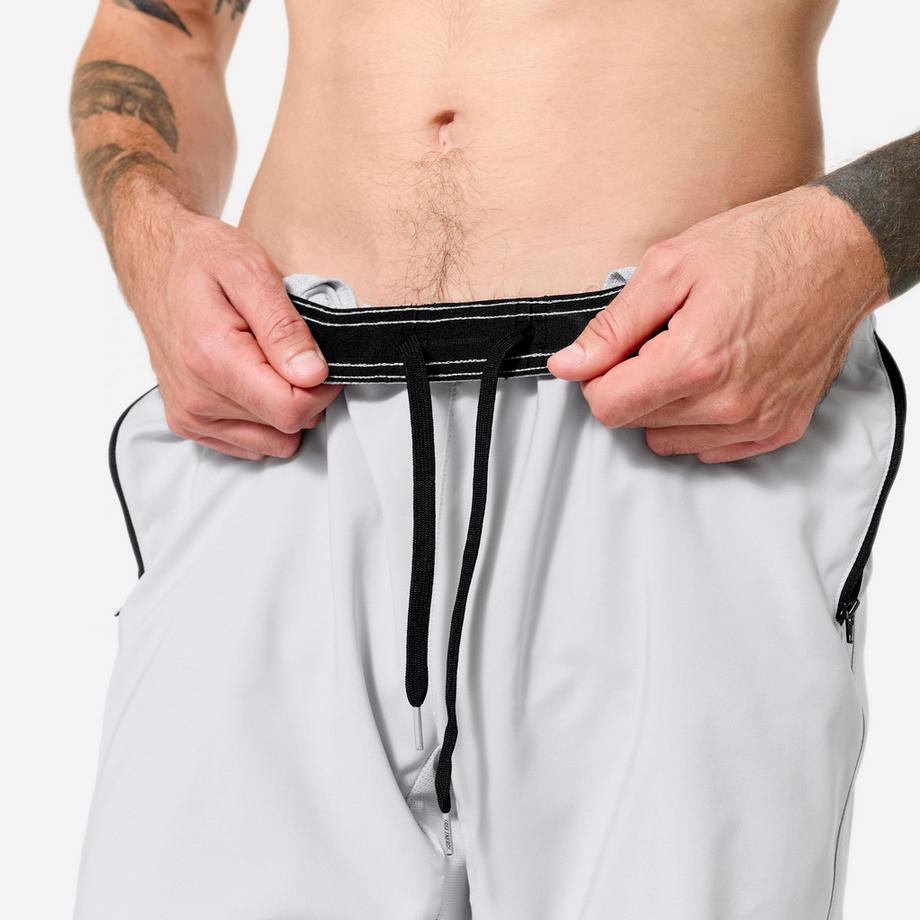 DOMYOS  Short de fitness respirant poches zippés homme, gris perle 