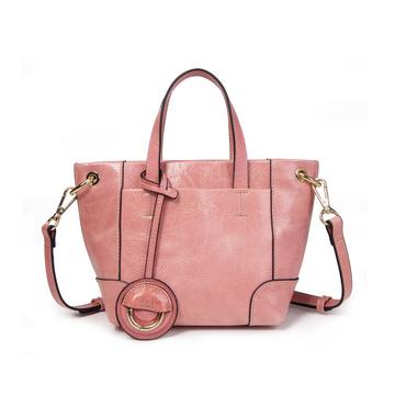 Petit sac porté main ou bandoulière en cuir Tane couleur rose