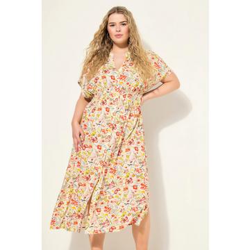 Robe maxi coupe trapèze à manches longues et patte de boutonnage. Imprimé floral