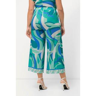 Ulla Popken  Jupe-culotte large, ceinture élastique. Jambe large descendant jusqu'au mollet. 