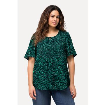 Blouse smockée à motif léopard, avec col rond et manches courtes. Ligne A