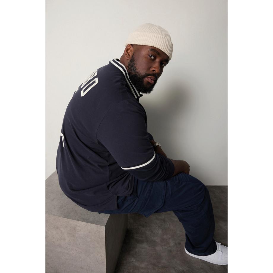 Sthuge Polo en maille piquée à manches courtes avec broderie au dos  