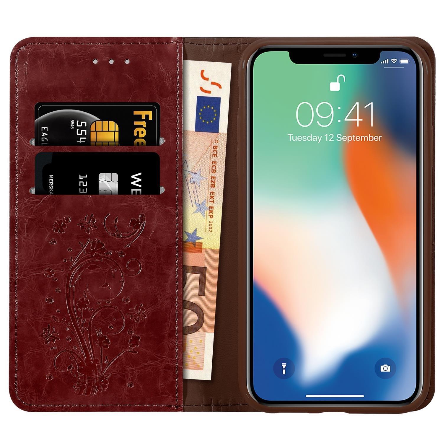 Cadorabo  Housse compatible avec Apple iPhone X / XS avec ornements - Coque de protection avec fermeture magnétique, fonction de support et compartiment pour carte 