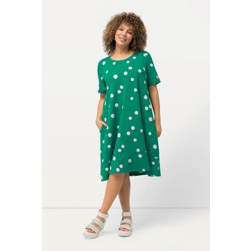 Robe midi à pois. Poches, col rond et manches courtes. Ligne en A.