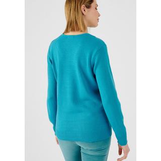 Damart  Pull col V maille jersey souple. 