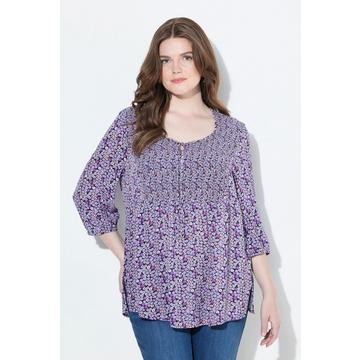 Blouse smockée, motif à fleurs, décolleté rond et manches 3/4, coupe évasée