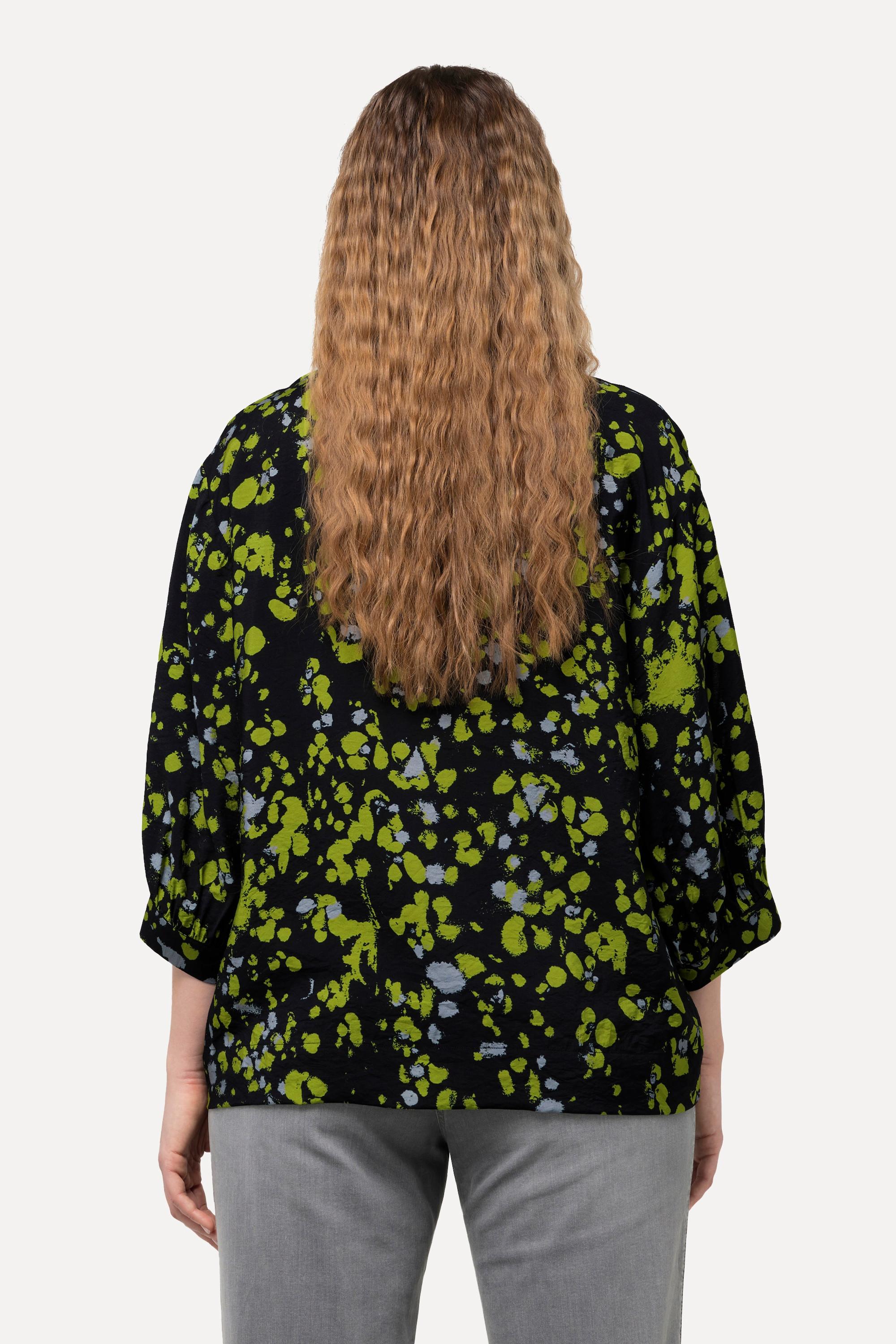 Ulla Popken  Blouse imprimé à pois. Col rond et manches longues. Silhouette en A. 