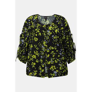 Ulla Popken  Blouse imprimé à pois. Col rond et manches longues. Silhouette en A. 