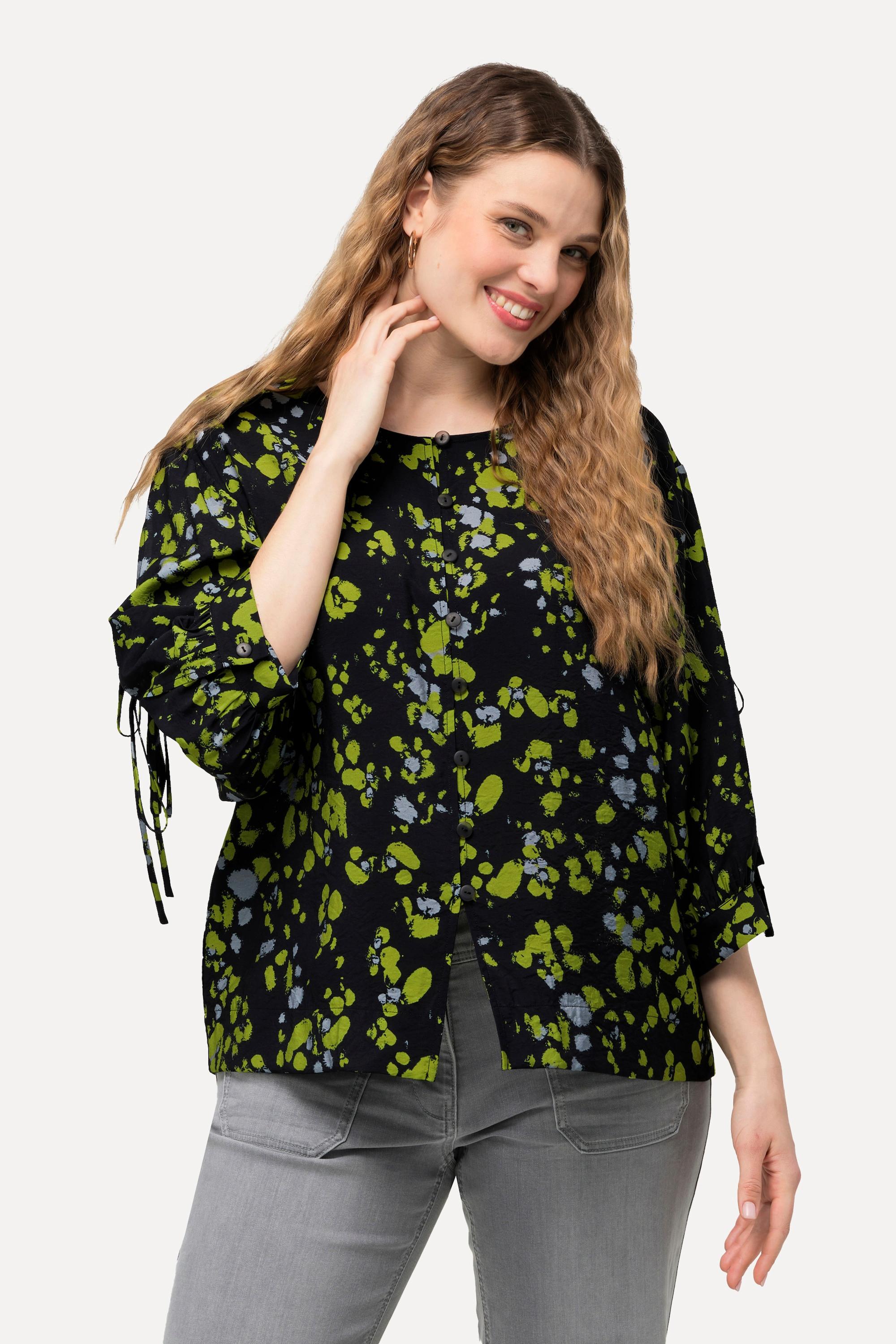 Ulla Popken  Blouse imprimé à pois. Col rond et manches longues. Silhouette en A. 